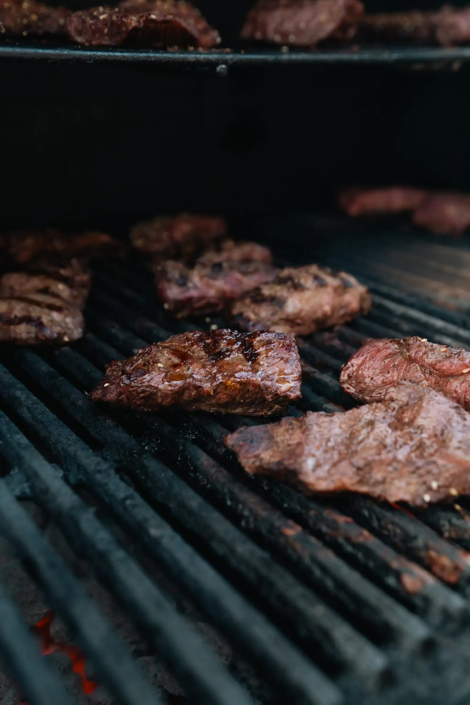 Steaks cooking on the outdoor grill