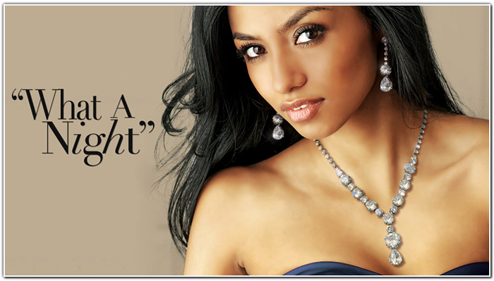 Model desplaying bridal jewelry ideas like a diamond necklace and earings as an example of an elegant option.
