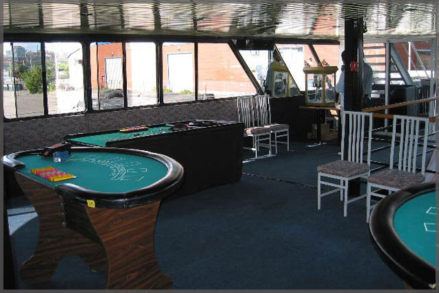 Casino cruise tables setup in the main salon.