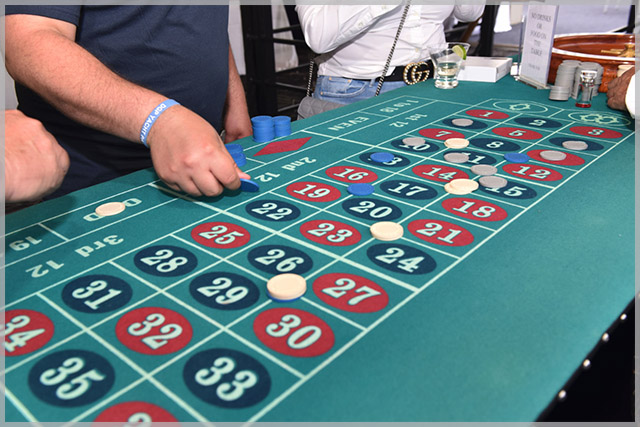 Roulette table with bets being placed part of our casino packages
