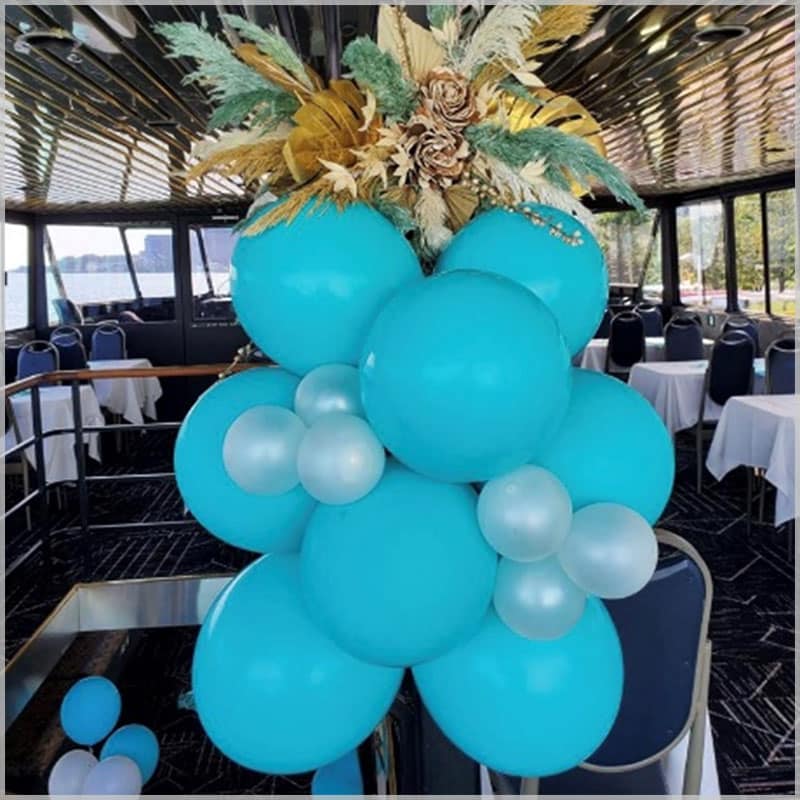 A party balloon bouquet in two shades of blue.